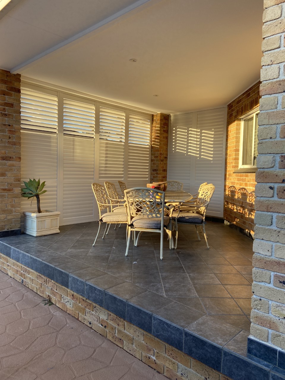 Aluminium shutters in an outdoor alfresco patio