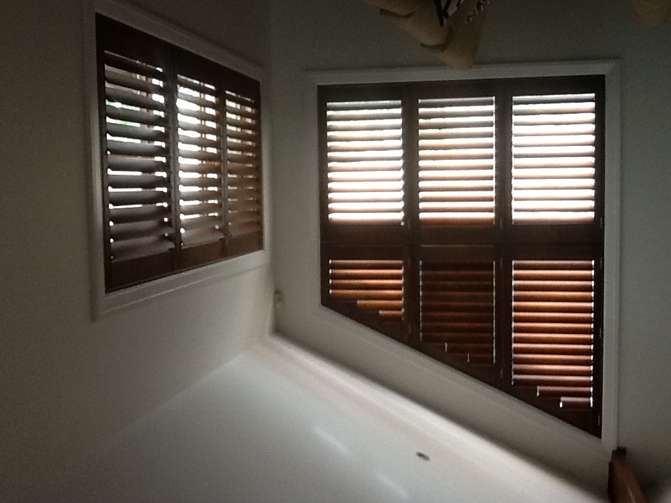 Timber shutters in a bathroom
