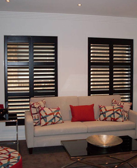 Dark timber shutters in a living room